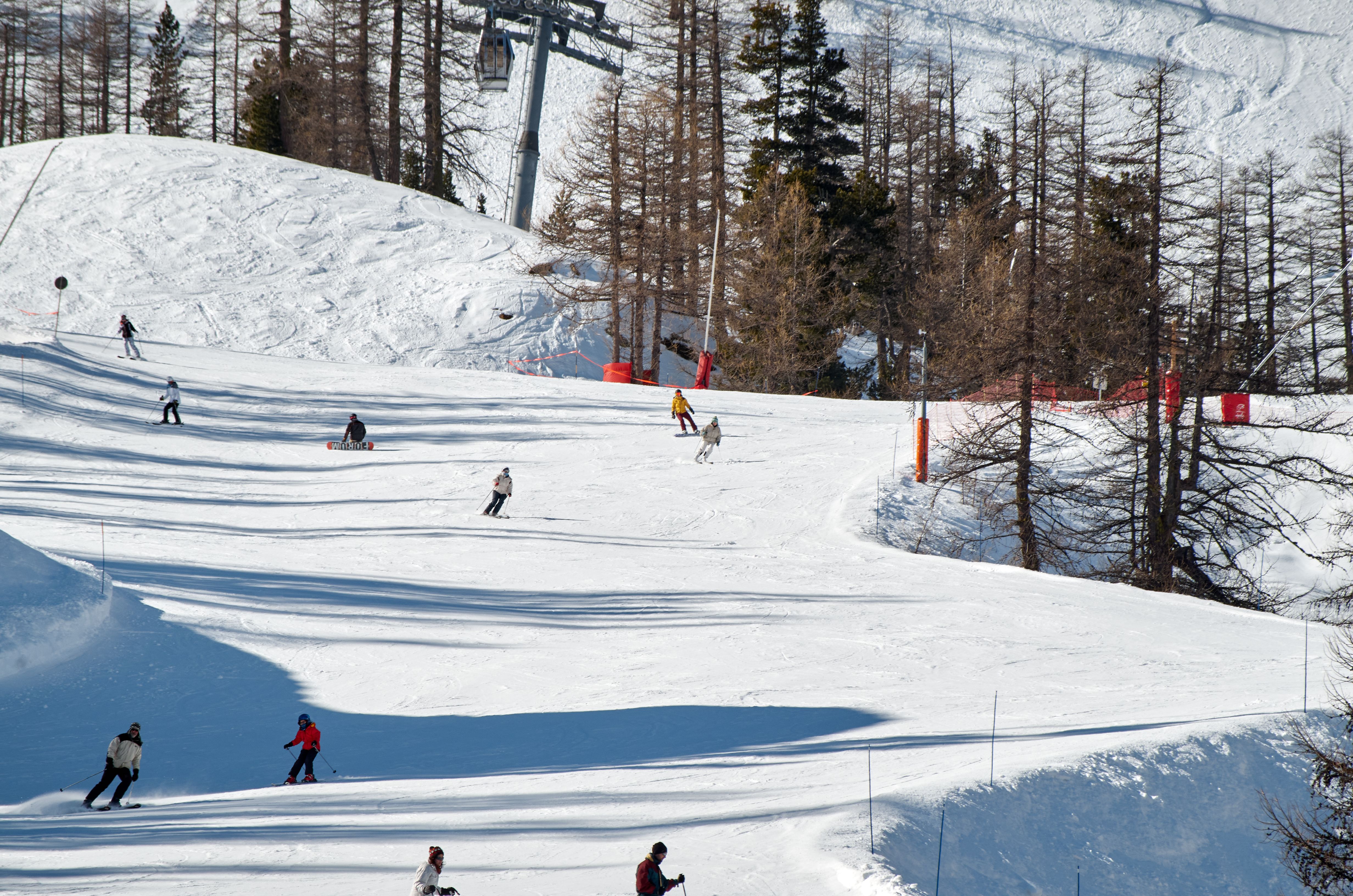 Mountain chairlift over a snowy slope