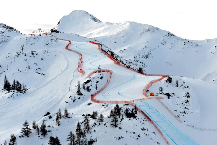 Aerial view of ski trails carved into a mountain